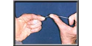 hands showing proper flossing technique